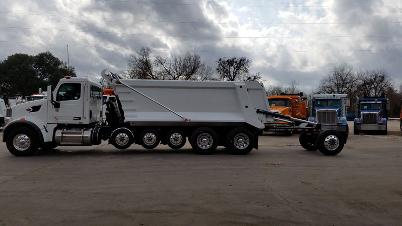 Peterbilt 567 Super Dump - Driver Side Strong Arm Down