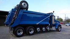 Peterbilt Super Dump Blue - Passenger Rear Angle Peterbilt Super Dump Blue - Passenger Rear Angle