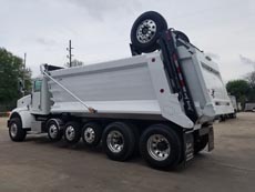 Peterbilt Super Dump - Driver Rear Angle Axles Up Peterbilt Super Dump - Driver Rear Angle Axles Up