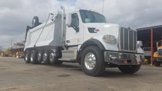 Peterbilt 567 Super Dump - Passenger Side Front Angle Peterbilt 567 Super Dump - Passenger Side Front Angle