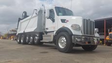 Peterbilt 567 Super Dump - Passenger Side Front Angle