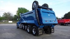 Peterbilt Super Dump Blue - Driver Rear Angle Peterbilt Super Dump Blue - Driver Rear Angle