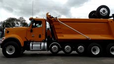 International HX520 Super Dump - Driver Side Axles Up (Cab) International HX520 Super Dump - Driver Side Axles Up (Cab)