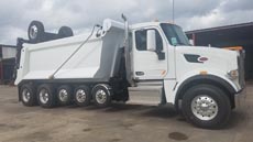 Peterbilt 567 Super Dump - Passenger Side Axles Up Peterbilt 567 Super Dump - Passenger Side Axles Up
