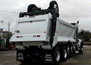 Kenworth T880 Super Dump - Passenger Rear Angle Axles Up Kenworth T880 Super Dump - Passenger Rear Angle Axles Up