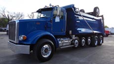 Peterbilt Super Dump Blue - Driver Front Angle Peterbilt Super Dump Blue - Driver Front Angle