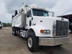 Peterbilt Super Dump - Passenger Front Angle Axles Up Peterbilt Super Dump - Passenger Front Angle Axles Up